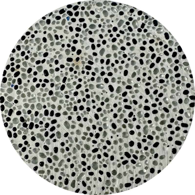 A black colored dots scattered on the light pallet with a unique pattern